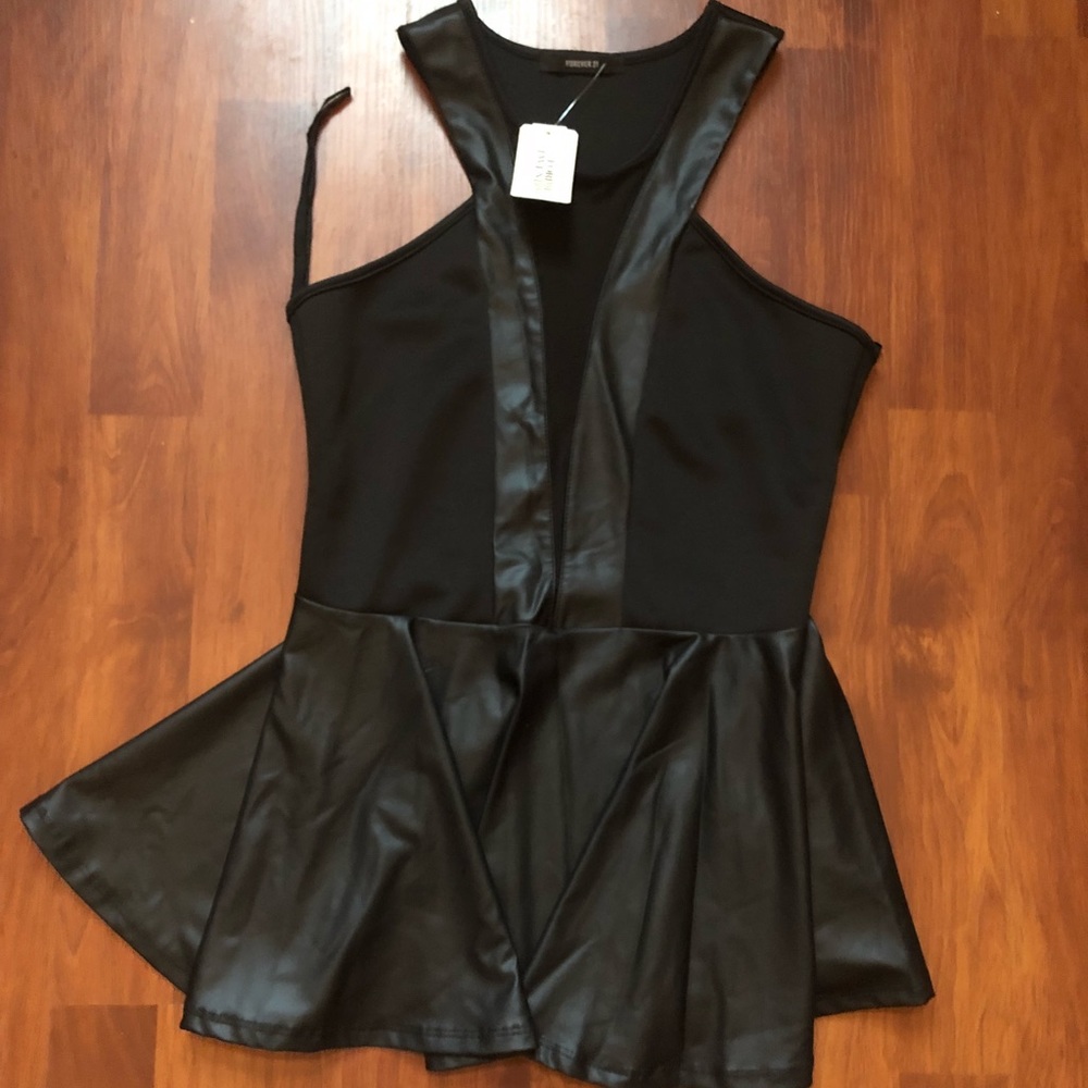 NWT. Black leather trim peplum top.